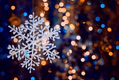 selective-focus-shot-of-decorative-snowflake-on-blurred-bokeh-background